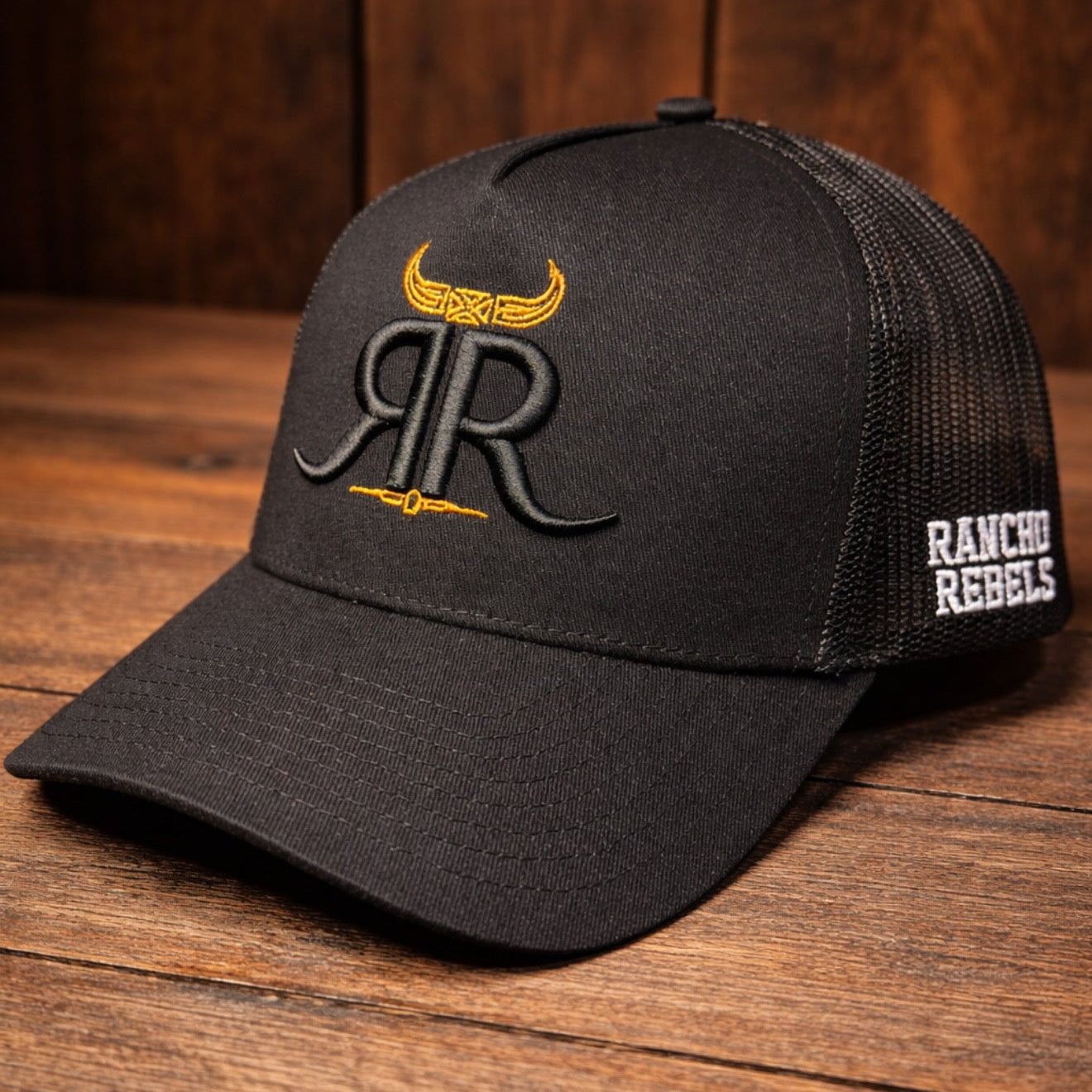 Black cap with 'RR' logo and 'Ranchos Rebels'